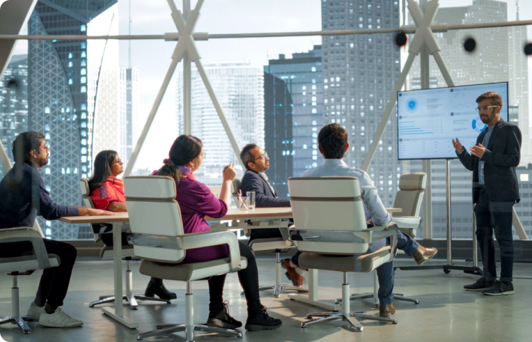 FOAP members attending a professional presentation in a conference room